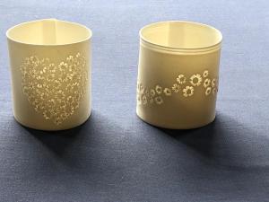 Delphine Roques,  Sakura Tealight Holder.  Porcelain paper clay ~7cm by 7cm  £22  Each