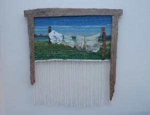 Angela Fotheringham,  Ellie’s Washing Line, hand spun, dyed & woven wool and driftwood, £375